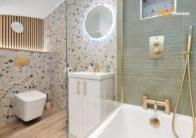 a bathroom with a shower and a toilet and a sink at 2 Bed Flat in Airdrie I Sleeps 4 I Parking in Moffat