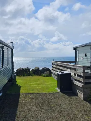 a view of the ocean from the side of a house at Number34 in Drummore