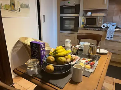 a bowl of fruit on a table in a kitchen at Deal - The place to stay in Moffat