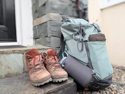 a pair of boots and a backpack sitting on a step at 3 Bed in Portinscale oc-w31059 in Portinscale