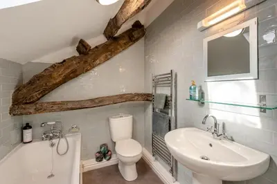 a bathroom with a sink and a toilet and a bath tub at 2 Bed in Dean oc-h32066 in Dean