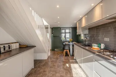 a kitchen with white cabinets and a counter top at 2 Bed in Dean oc-h32066 in Dean