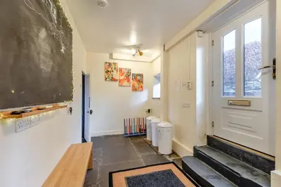 a classroom with a chalkboard on the wall and a blackboard at 5 Bed in Keswick oc-h33619 in Keswick