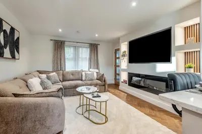 a living room with a couch and a flat screen tv at 2 Bed in Gretna Green oc-n34146 in Gretna Green