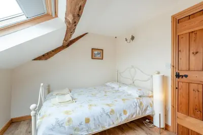 a bedroom with a bed in a room at 3 Bed in Kirkbampton oc-l32005 in Burgh by Sands
