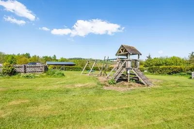 a playground with a slide in a field at 1 Bed in Isel oc-b32075 in Sunderland
