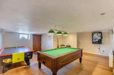 a living room with two pool tables in it at 2 Bed in Isel oc-o32077 in Sunderland