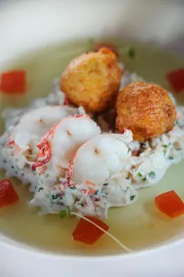 a plate of food with rice and meatballs at Regency Hotel in Douglas