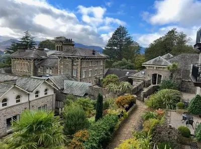a large mansion with a garden in front of it at Underscar - Great Gable in Keswick