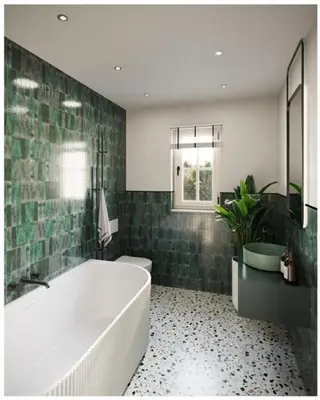 a bathroom with a tub and a green tiled wall at The Beach House in Moffat