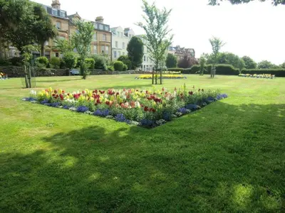a flower bed of tulips in a park at Arrandale House in Douglas