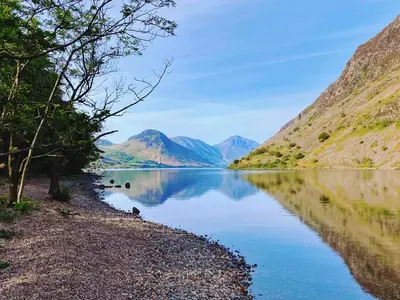 a view of a lake with mountains in the background at Bower House Inn in Eskdale