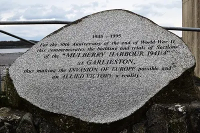 a rock with a poem written on it at Cladach in Garlieston