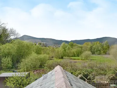 a view of a garden from the roof of a house at 3 Barf Cottages in Portinscale