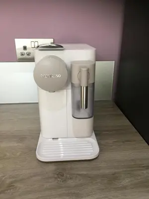 a white coffee maker sitting on top of a counter at Ancrum House in Gretna Green