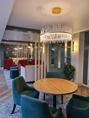 a dining room with a table and chairs at Smiths At Gretna Green Hotel in Gretna Green