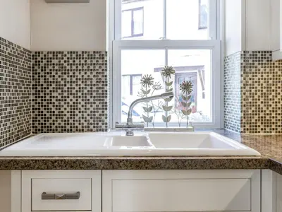 a kitchen with a sink and a window at Tommy's Cottage in Keswick