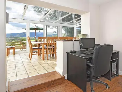 an office with a desk with a computer on it at Holly Bank in Bassenthwaite