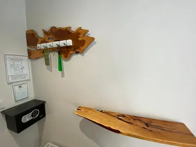 a piece of wood hanging on a wall at Westwood - The B&B with a view in Cockermouth