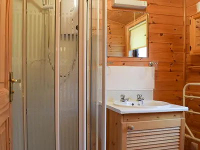 a bathroom with a sink and a shower at Whiteside Lodge At Burnside Park in Keswick