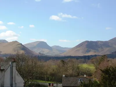 a view of a mountain range with mountains in the background at 3 The Hollies in Keswick