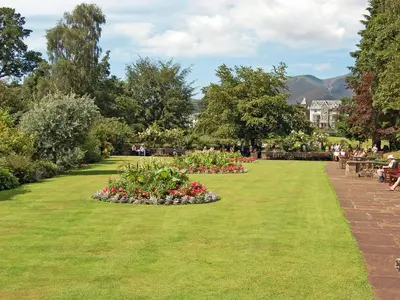a park with some flowers in the grass at La'al Gem in Keswick