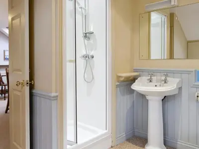 a bathroom with a sink and a shower at Brasscam in Rosthwaite