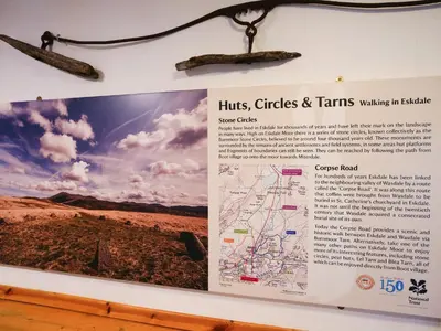 a sign for the huts giraffes and tanners walking in at YHA Eskdale in Eskdale