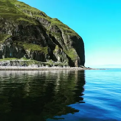 a view of the ocean and a rocky shore at The Toll House in Newton Stewart