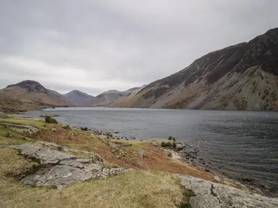 a large body of water with mountains in the background at Stable End Cottage in Nether Wasdale