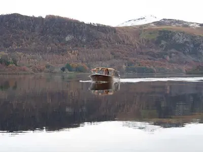 a boat in the middle of a large body of water at Littlebeck in Rosthwaite