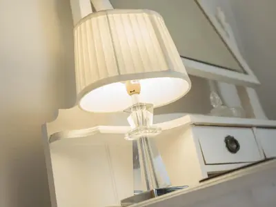 a white lamp sitting on top of a table at Ellwood House in Caldbeck