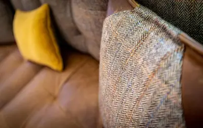 a banana sitting on top of a couch at Heads Nook Hall Cottage in Carlisle
