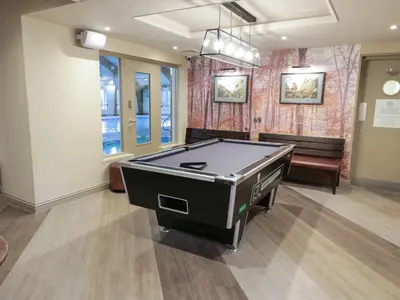 a room with a pool table in it at Brunston Castle Lodge in Girvan