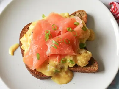 a piece of bread with eggs and ham on it at Woolpack Inn in Eskdale