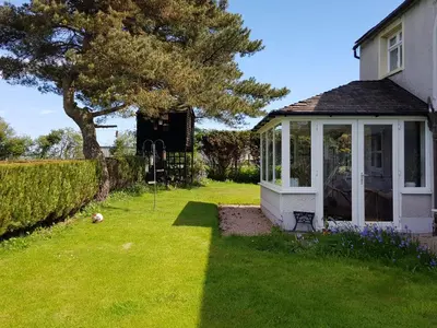 a gazebo in the yard of a house at Newby Cross in Carlisle