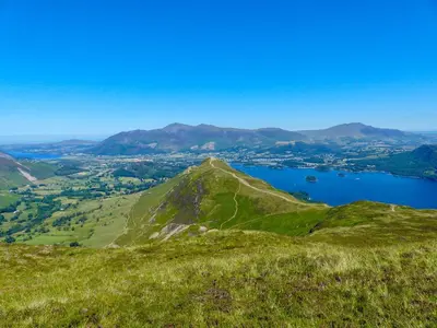 a view from the top of a mountain with a lake at Castle Howe in Rosthwaite