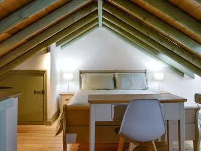 a bedroom with a bed with a desk and a chair at Harrison's Lodge - Uk1259 in Threlkeld