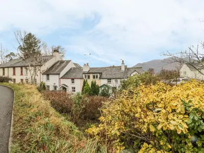 a group of houses on the side of a hill at Derwent Edge in Portinscale