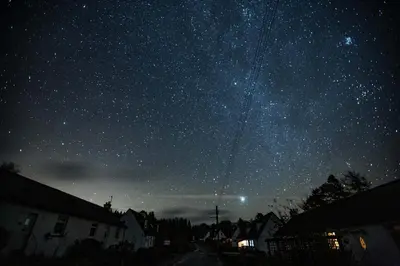 a starry night with the milky way in the sky at Kelpies Cottage in Newton Stewart