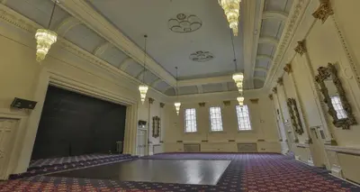 a large room with a stage in the middle of it at Carlisle Station Hotel, Sure Hotel Collection by BW in Carlisle