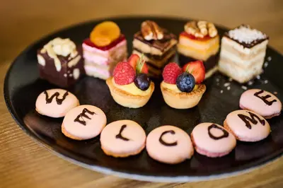 a plate of pastries with the word cocoa on them at Comis Hotel & Golf Resort in Douglas