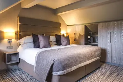 a bedroom with a large bed in a room at The Grand at Grasmere in Grasmere