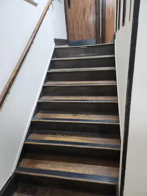 a set of stairs leading up to a door at The Queensberry Hotel in Dumfries