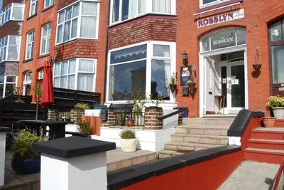 a store front of a brick building at Rosslyn in Douglas