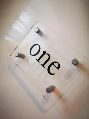 a close up of a clock with the word rent at Black Bull Inn, Moffat in Moffat