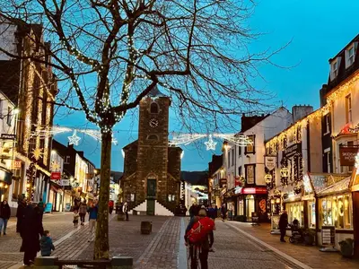 a town with a clock tower in the middle of a street at Fitz House in Keswick