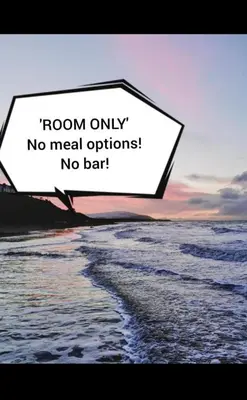 a sign that reads room only nomean opinions no bar on the beach at Westcliff in Seascale