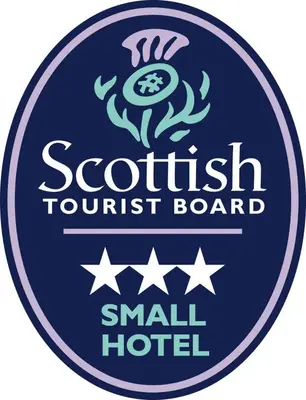 a label for a small hotel with a crab on it at The Fairburn Hotel in Mauchline