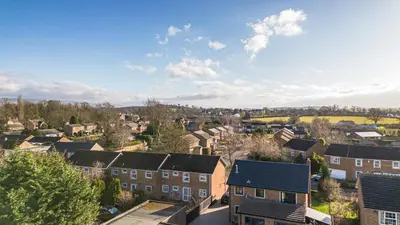 an aerial view of a residential neighbourhood with houses at Cosy Apartment in Wetheral,Cumbria in Wetheral